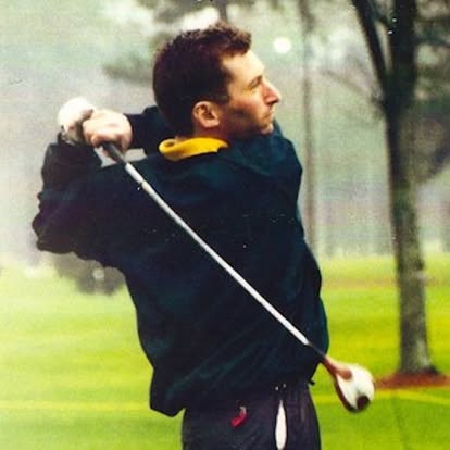 Golfer mid-swing at The Vernon Open